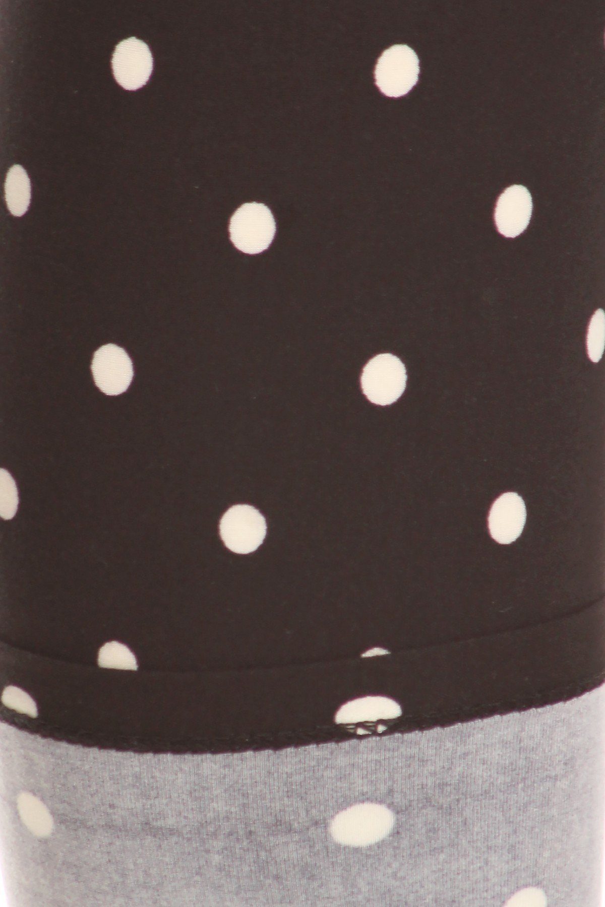 High Waisted Leggings With An Elastic Band In A White Polka Dot Print Over A Black Background - Absolute Fashion 2020